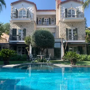 https://yuga-alacati.aegeanhotels.net